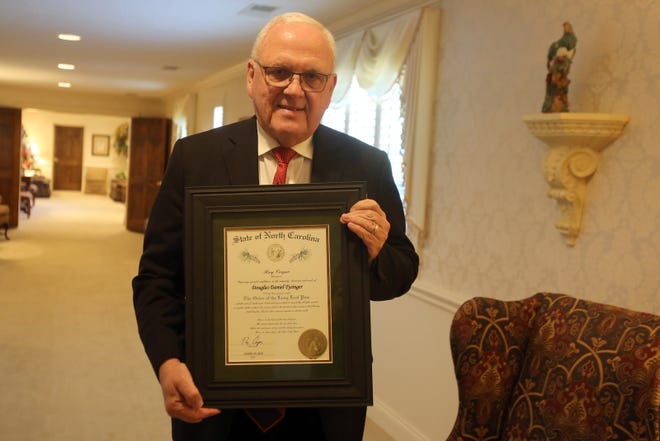 Doug Tysinger was recently awarded the Order of the Long Leaf Pine Award for his service to the community. [Brittany Randolph/The Star]