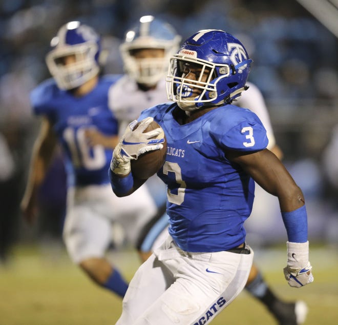 Tuscaloosa County running back Damien Taylor rushed for 375 yards and scored five touchdowns in the Wildcats' 42-21 win against Spain Park on Thursday. [Staff Photo/Gary Cosby Jr.]