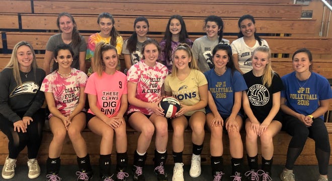 The St. John Paul volleyball team, from left, front row, includes Coach Haley Cabral, Piper Tinory, Jenna Ellis, Melissa Van Cott, Brooke Whitten, Brooke Eger, Emily Bach, and Coach Shannon Kennedy-Cabral. Back Row: Alex Stampfl, Hadley Crosby, Sophia Tropeano, Anna Julia Coelho, Delaney Burrell, and Anna Ferreria. [BP PHOTO BY MIKE RICHARD]
