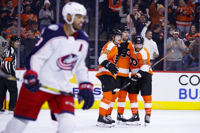 Blue Jackets defenseman Seth Jones skates off the ice after the Flyers scored one of their seven goals in Saturday's game. A five-goal flurry by Philadelphia in the third period resulted in goaltender Joonas Korpisalo slamming his stick in frustration. [Chris Szagola/The Associated Press]