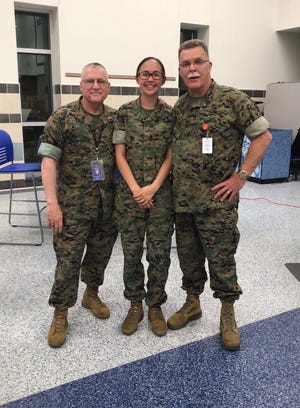From left, CW5 Cookson, Cadet Sit and 1st Sgt. Yates are members of the Bensalem High School Marine Corps Junior Reserve Officers' Training Corps program, or MCJROTC. [CONTRIBUTED]