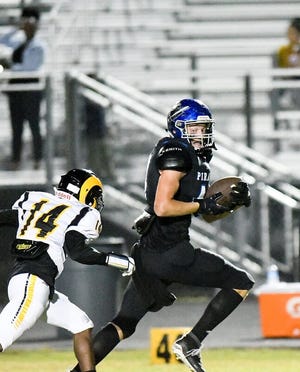 Matanzas defensive end Rex Robich (44) heads downfield after recovering a fumble during last Friday's game against Englewood. [Special to News-Tribune/Bob Rollins]