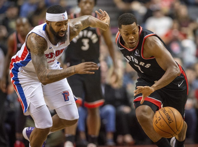 Toronto Raptors' Kyle Lowry (7) steals the ball from Detroit Pistons' Markeiff Morris (8) during the first half of an NBA basketball game, Wednesday, Oct. 30, 2019 in Toronto. (Frank Gunn/Canadian Press via AP)