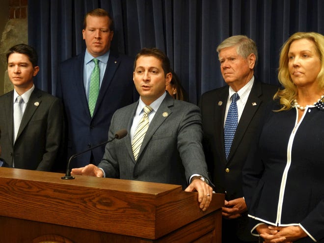 A group of Senate Republicans led by Sen. Jason Barickman, center, discuss their bill to strengthen the office of legislative inspector general during a Statehouse news conference Wednesday at the Capitol in Springfield. Barickman is flanked by, from left, Republican Sens. Steve McClure, of Springfield, Jason Plummer, of Edwardsville, Jil Tracy, of Quincy, Jim Oberweis, of Sugar Grove, and Sue Rezin, of Morris. [PETER HANCOCK/CAPITOL NEWS ILLINOIS]