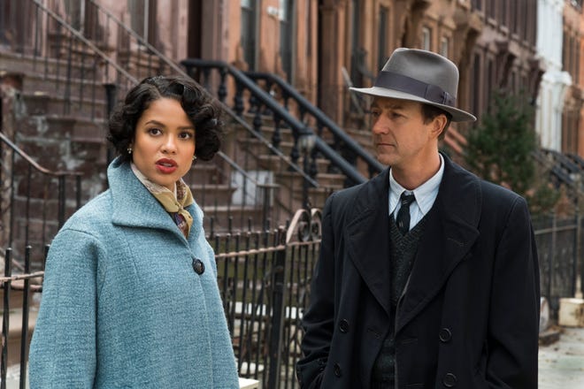 Gugu Mbatha-Raw and Edward Norton try to untangle the many mysteries of 1950s New York. [Warner Bros.]