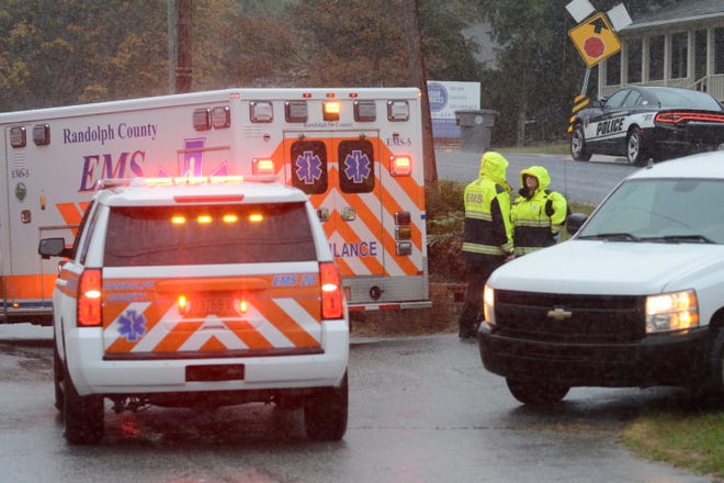 First responders with Asheboro Fire and Randolph EMS arrive on the scene of a reported hit and run after a driver struck a child and left the scene. [Scott Pelkey / The Courier-Tribune]