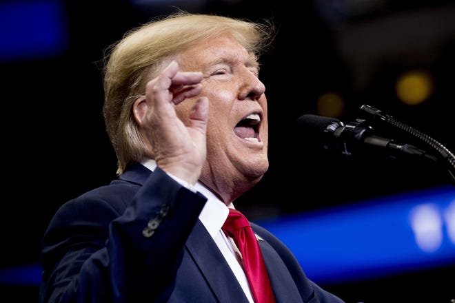 Texas voters are evenly split on the impeachment proceedings involving President Donald Trump in the U.S. House, according to a new University of Texas/Texas Tribune Poll. [ANDREW HARNIK/THE ASSOCIATED PRESS]
