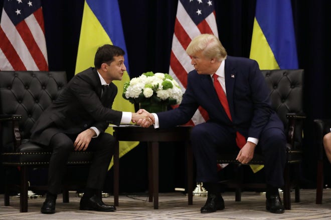 Ukrainian President Volodymyr Zelensky meets with President Donald Trump in September. A phone call between the two is at the crux of the impeachment inquiry into Trump. [ASSOCIATED PRESS FILE}