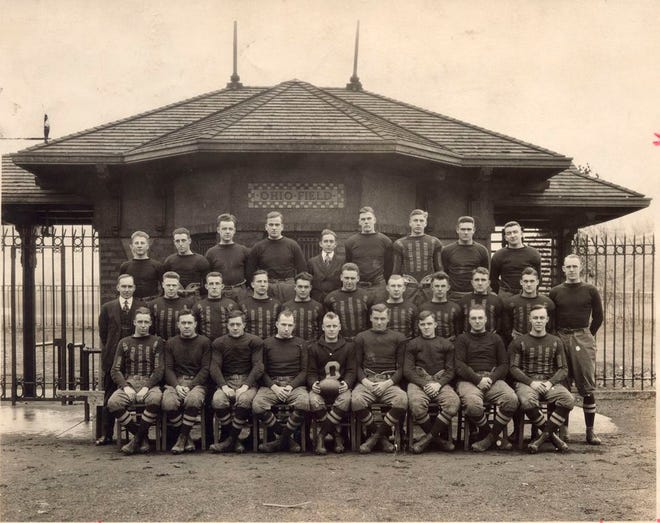 Members of the 1916 Ohio State football team at Ohio Field. BACK ROW: William E. Cramer, Leon Friedman, A.T. Leonard, Harry Lapp, Bill Daugherty (manager); Earl Johnson, Clarence McDonald, Kelly VanDyne and B.E. Sullivan. MIDDLE ROW: L.W. St. John (athletic director); Roy Kirk; Fred Norton; Howard Yerges, Chic Harley, Dick Boesel; Frosty Hurm, Charles Daughters, Virgil Drayer, Gordie Rhodes and Dr. John W. Wilce (coach). FRONT ROW: Dwight Peabody; Howard G. Courtney, Harold J. Courtney, Irwin Turner, Frank "Swede" Sorenson, captain (with ball); Fritz Holtcamp, Charlie Seddon, Robert Karch and Charles Bolen.