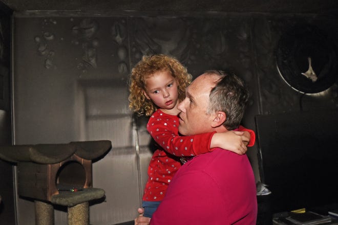 Autumn Skelton and her father Adam Skelton stand in their burned and destroyed home, where they lost everything in a fire on Aug. 18. They also lost three cats and a dog in the fire.

[Deb Cram/Fosters.com and Seacoastonline, file]