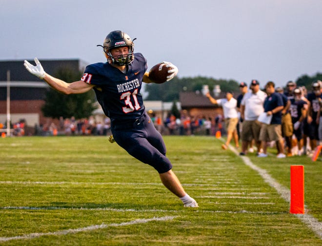 Rochester's Jacob DuRocher goes in for a touchdown to give the Rockets an early lead in a Central State Eight Conference win over Decatur MacArthur on Friday. [Justin L. Fowler/The State Journal-Register]