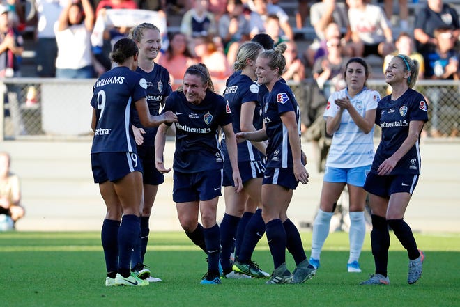 North Carolina Courage's Heather O'Reilly (17), center, leaves the filed during the second half of the NWSL championship soccer game against the Chicago Red Stars in Cary, N.C., Sunday, Oct. 27, 2019. (AP Photo/Karl B DeBlaker)
