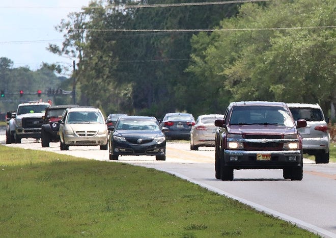 Williamson Boulevard traffic just north of the LPGA Boulevard intersection narrows from four lanes to two. Volusia County officials are working to fund widening Williamson to four lanes all the way to Hand Avenue. [News-Journal File/David Tucker]