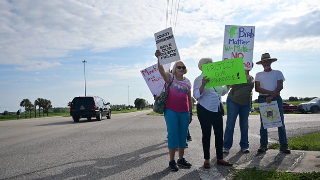 Sarasota County bird watchers, nature lovers and residents gather Saturday morning to protest the possible rezoning of land adjacent to the Celery Fields. [Courtesy photo / Daniel Perales]