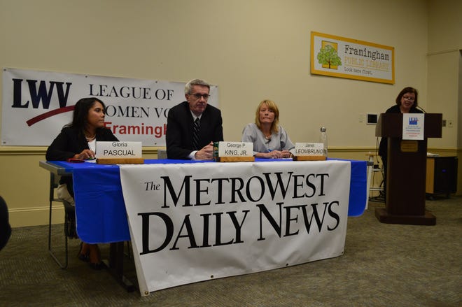 Candidates for two at-large seats on the Framingham City Council participated in a forum last Monday at the Framingham Public Library. From left are School Committee member Gloria Pascual, incumbent At-Large City Councilor George King and former Town Meeting member Janet Leombruno.  [Daily News Staff Photo / Jeanette Hinkle]