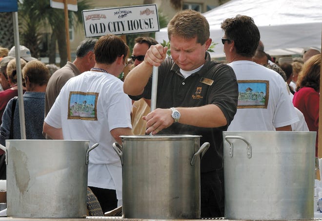 Tom Attila stirs up clam chowder at the 95 Cordova booth during a past Great Chowder Debate. [FILE]
