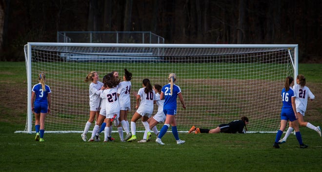 Mountain Lakes celebrates its overtime victory over Kittatinny after Alexa Krause’s penalty kick two minutes into the second overtime lifted the Lakers to a 3-2 win in the teams’ North 1, Group 1 semifinal matchup on Monday at Kittatinny High School. [Photo by Daniel Freel/New Jersey Herald (NJH)]