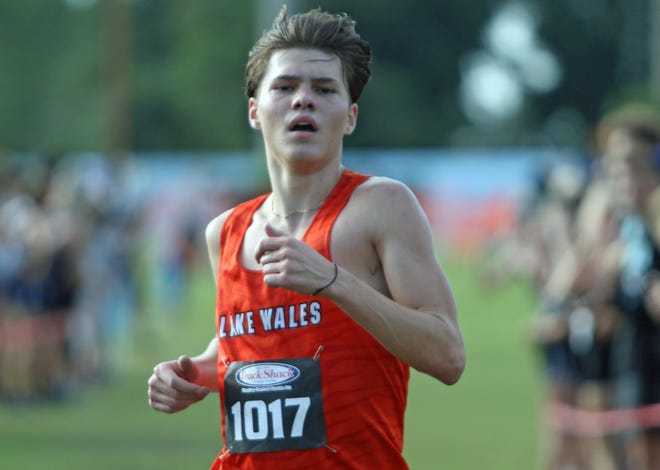 Lake Wales' Andy Denton takes aim at winning the Class 3A race ast this week's state meet. [ROY FUOCO/THE LEDGER]