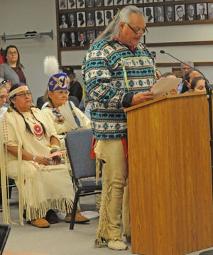 Lakota Native American Travis Benoist, of Salina, reads the proclamation stating November, 2019 as "Native American Heritage Month" in the city of Salina during the City Commission meeting on Monday. [AARON ANDERS/SALINA JOURNAL]