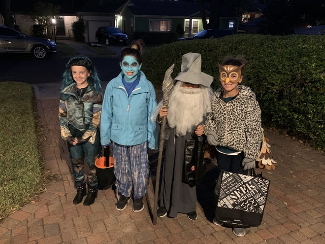 This year for Halloween, Alexis Berson, second from left, went trick-or-treating as Genie from "Aladdin." [Contributed by Kostumes for Kids]