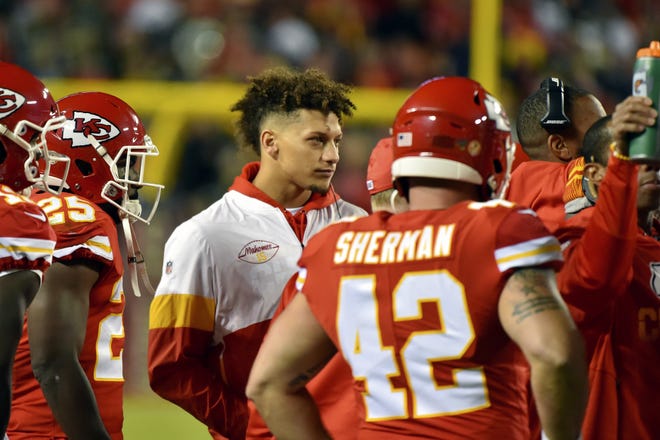 Kansas City Chiefs quarterback Patrick Mahomes follows the first half of a game against the Green Bay Packers from the sidelines Oct. 27 in Kansas City. [Ed Zurga/The Associated Press]