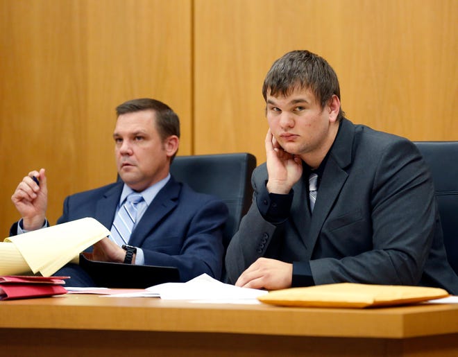 Gage Hall and his attorney, Kevin Kohl, listen to testimony during his trial at the Polk County Courthouse in Bartow. Hall was found not guilty by a jury Wednesday on the charge of sexual battery for an incident that occurred at Warren University in September 2017. [PIERRE DUCHARME/THE LEDGER]