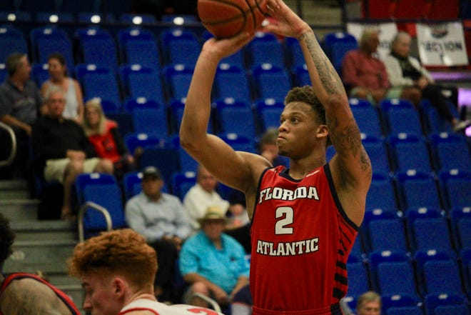 Florida Atlantic guard Everett Winchester, a Wright State transfer, scored eight points in his Owls debut. [ESTON T. PARKER III/GATEHOUSE FLORIDA]