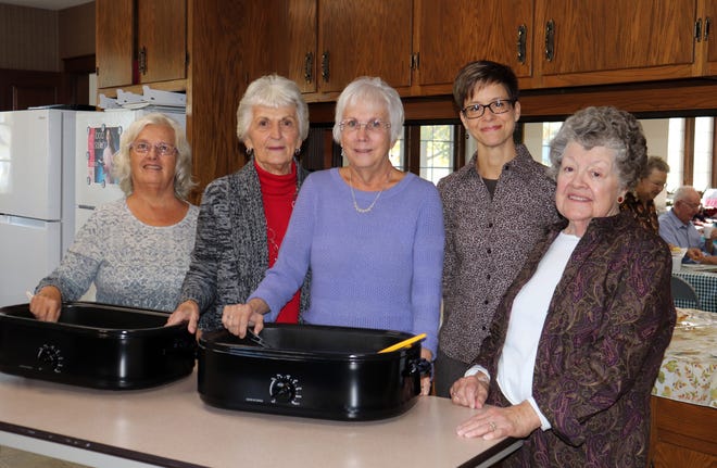 Connie Reidenbach (left), Sue Martin, Deb Zuercher, Heidi Barbey and Jo Ramseyer begin preparations for the baked potato and taco bar to be held at Faith Lutheran Church in Millersburg on Thursday, Nov. 14. Serving starts at 4:30 and cost is by donation. Carry-out is available. All proceeds will go to hurricane relief efforts in the Bahamas.
