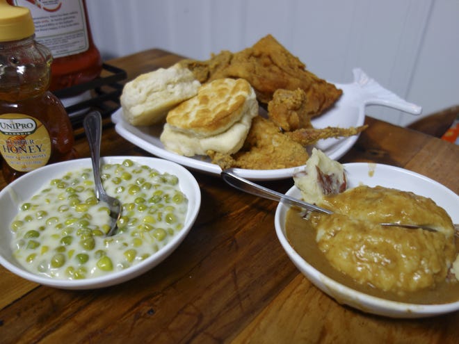 The Half Fried Bird entree ($12.98, add $2.50 for all white meat) is ready to take down the heartiest of appetites with a breast, thigh, wing and drumstick, two homemade sides and two biscuits. [Jay Magee/for the Times-Union]
