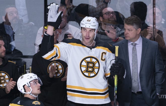 Boston's Zdeno Chara will be looked at to lead a defensive corps that has been hit with injuries and inconsistency lately. [The Associated Press]