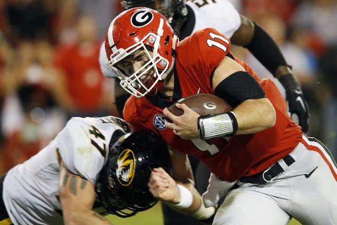 Georgia quarterback Jake Fromm dives in for a touchdown in the first half of the Bulldogs' 53-14 win over Missouri two seasons ago. (Photo/Joshua L. Jones, Athens Banner-Herald)