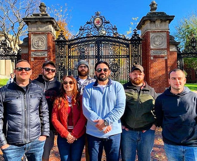 In the front row, from left, are Bobby Andrade, Delight Bucko, JJ Massi, Dustin Durfee, and Alex Labossiere; in the back are Rob Murray and Ruben Braun. Bucko and Massi took a group of student veterans from Bristol Community College to a tour of Brown University in Providence. [Submitted Photo]
