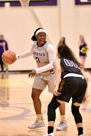 Kansas Wesleyan point guard Haleigh Bradford (3), calls out a play Friday night as Haley Villegas of Embry-Riddle defends Friday night at Mabee Arena. [KIM RAYAS/SALINA JOURNAL]