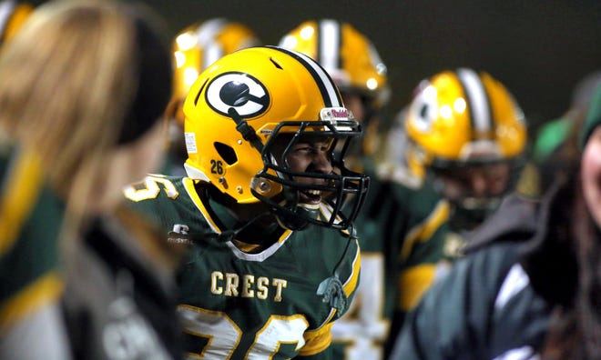 Crest’s Marcus Russell celebrates a big play during Friday’s game against Kings Mountain. [BRITTANY RANDOLPH/The Star]