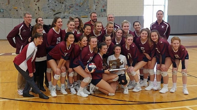Members of the Westboro girls' volleyball team pose with the runner-up trophy after Saturday's Central Division 2 final at Wellesley High. The Rangers fell to Canton 3-1. [Photo/Jared Keene]