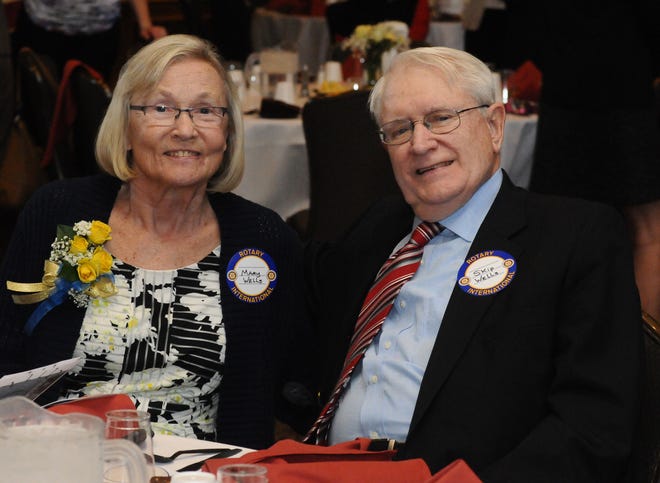 Mary Wells sits with her husband, Harold, as she is honored at the Moorestown Community Center in 2016. She was a trailblazer in the community and one of the first two female members of the Moorestown Rotary Club. [FILE]