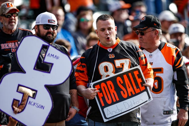 Fans jeer in the stands during the first half of NFL football game between the Cincinnati Bengals and the Baltimore Ravens, Sunday, Nov. 10, 2019, in Cincinnati. (AP Photo/Gary Landers)