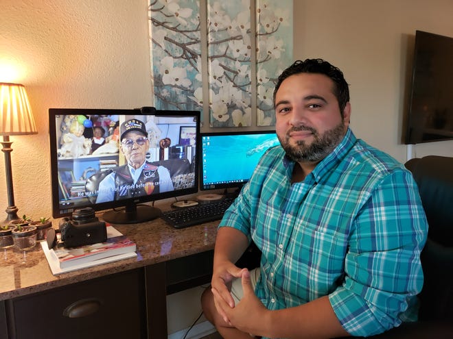 Deltona resident Rocco Anastasio plays the trailer for his documentary, “In Their Words - Of Service and Sacrifice,” on his computer in his home. His film, which tells the stories of five veterans, will premiere on Veterans Day during a special event at The Center. [News-Journal/Katie Kustura]