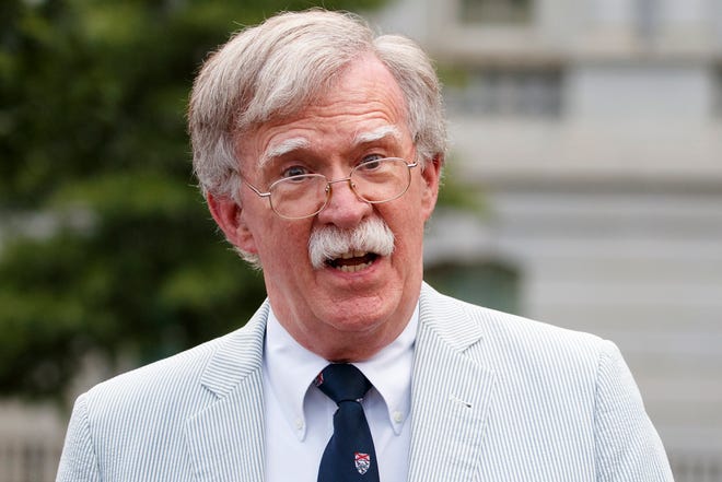 Then-national security adviser John Bolton speaks to media at the White House in Washington in July. [CAROLYN KASTER/THE ASSOCIATED PRESS]