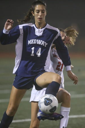 Mia Cence and Medway have a date in the sectionakl semifinals with Dartmouth on Monday in Easton. [Daily News and Wicked Local File Photo/Dan Holmes]