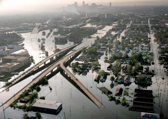 Floodwaters from Hurricane Katrina fill the streets near downtown New Orleans in August 2005. The most destructive U.S. hurricanes are hitting three times more frequently than they did a century ago, a new study by a Danish research team said Monday. [DAVID J. PHILLIP/THE ASSOCIATED PRESS (FILE)]