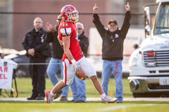 Chatham Glenwood High School's Tyler Burris (44) goes in for his third touchdown of the game against Lemont in the second half during the second round of the IHSA Class 6A playoffs on Saturday in Chatham. [Justin L. Fowler/The State Journal-Register]