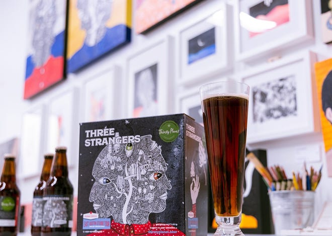 Thirsty Planet's Three Strangers is a cross between a hoppy Vienna lager and a dark Mexican lager. "The appearance and taste are having a conversation with you, thus, (the name) Three Strangers," according to the brewery. [Contributed by Thirsty Planet]