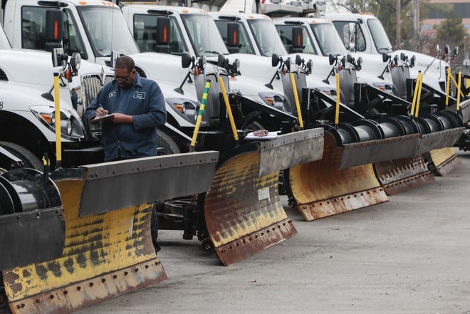 Mike Thompson, an Ohio Department of Transporation auto technician, inspects snow plows as the department prepares for the upcoming winter weather season on Wednesday, October 30, 2019 at the Ohio Department of Transportation Fifth Avenue Garage in Columbus, Ohio. [Joshua A. Bickel/Dispatch]