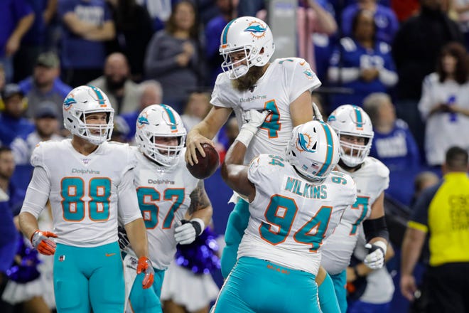 Ryan Fitzpatrick and the Dolphins made it two straight last Sunday in Indianapolis. [AP/Darron Cummings]