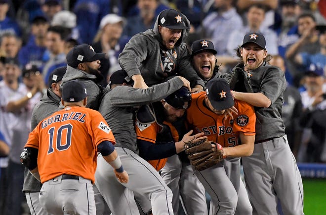 The Houston Astros celebrate after their win against the Los Angeles Dodgers in Game 7 of baseball's World Series Wednesday, Nov. 1, 2017, in Los Angeles. The Astros won 5-1 to win the series 4-3. (AP Photo/Mark J. Terrill)