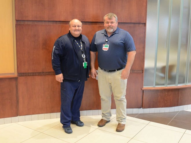 ProMedica Monroe Regional Hospital employees Gregory Grant, director of Emergency Services, and Dr. Spencer Johnson, medical director of the emergency department, are pictured. [MONROE NEWS PHOTO BY TYLER EAGLE]