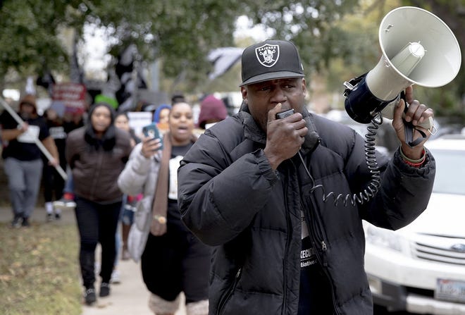 Rodrick Reed leads a march during a protest Wednesday in Bastrop against the execution of his brother, Rodney Reed. Rodney Reed is scheduled to be executed Nov. 20, but a growing number of politicians and celebrities have joined calls to further examine his case before his execution proceeds. [NICK WAGNER/AMERICAN-STATESMAN]