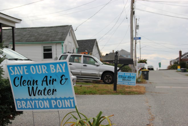 Signs protesting recent work at Brayton Point Commerce Center have begun popping up on the front yards of Brayton Point homes.