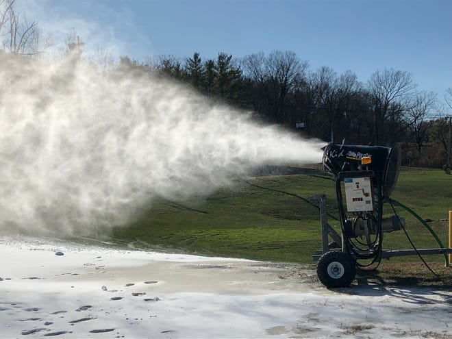 A machine makes and blows snow onto the slopes at Mountain Creek Ski Resort Wednesday. [Photo by Kyle Morel/New Jersey Herald (NJH)]